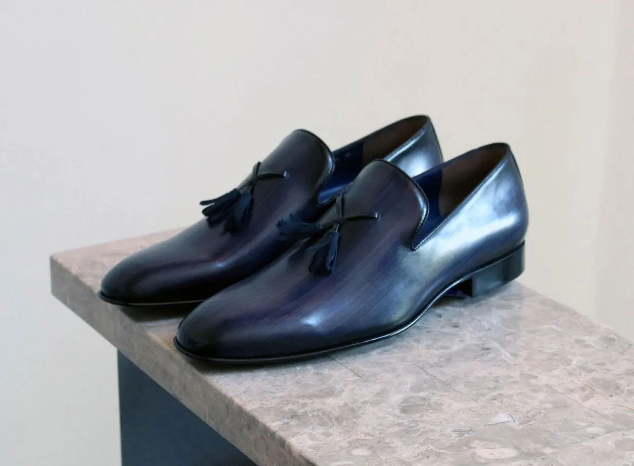 Jean Pierre Handpoliertes Kalbsleder-Penny-Loafer mit Quaste in Marineblau
