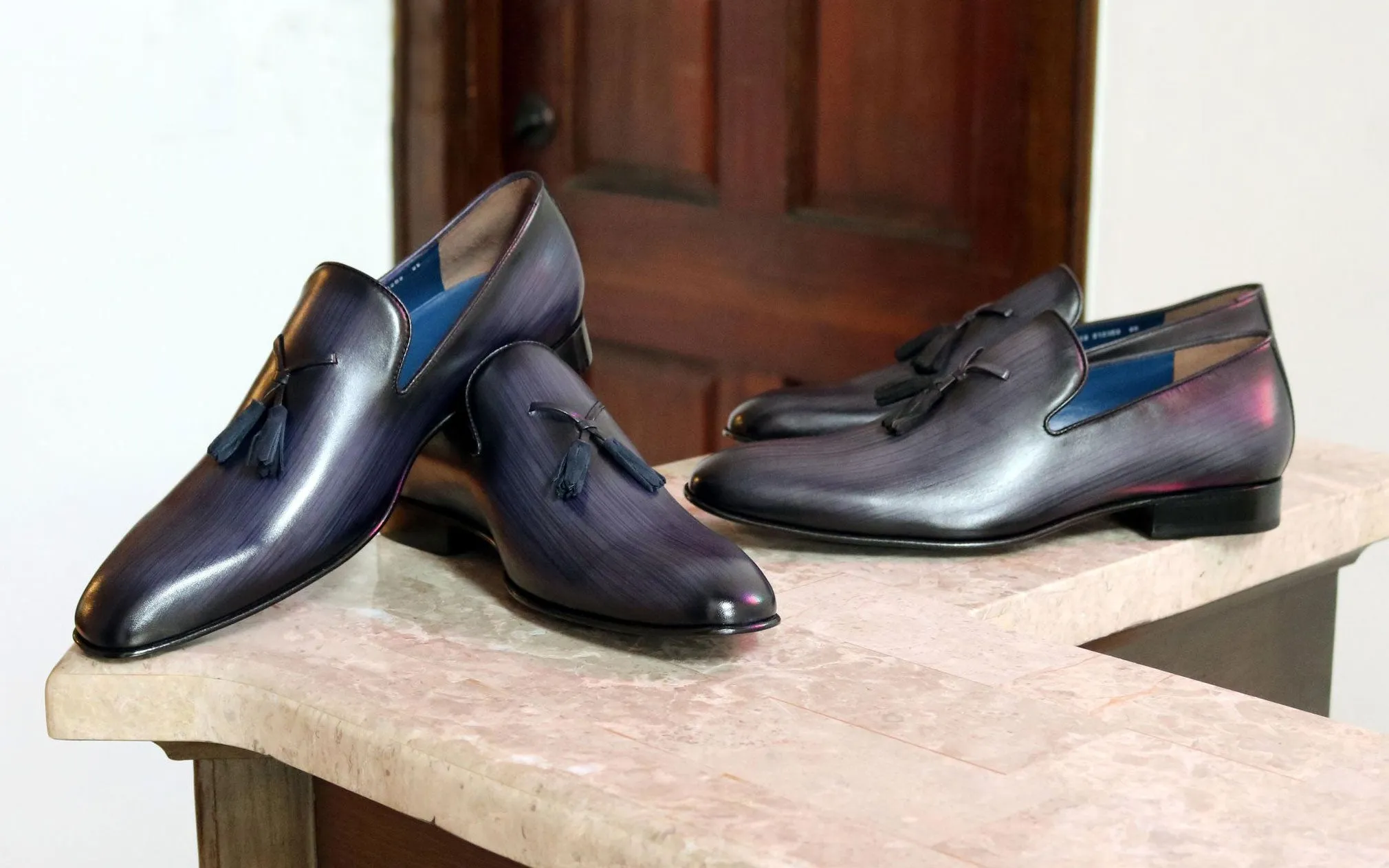 Jean Pierre Handpoliertes Kalbsleder-Penny-Loafer mit Quaste in Marineblau