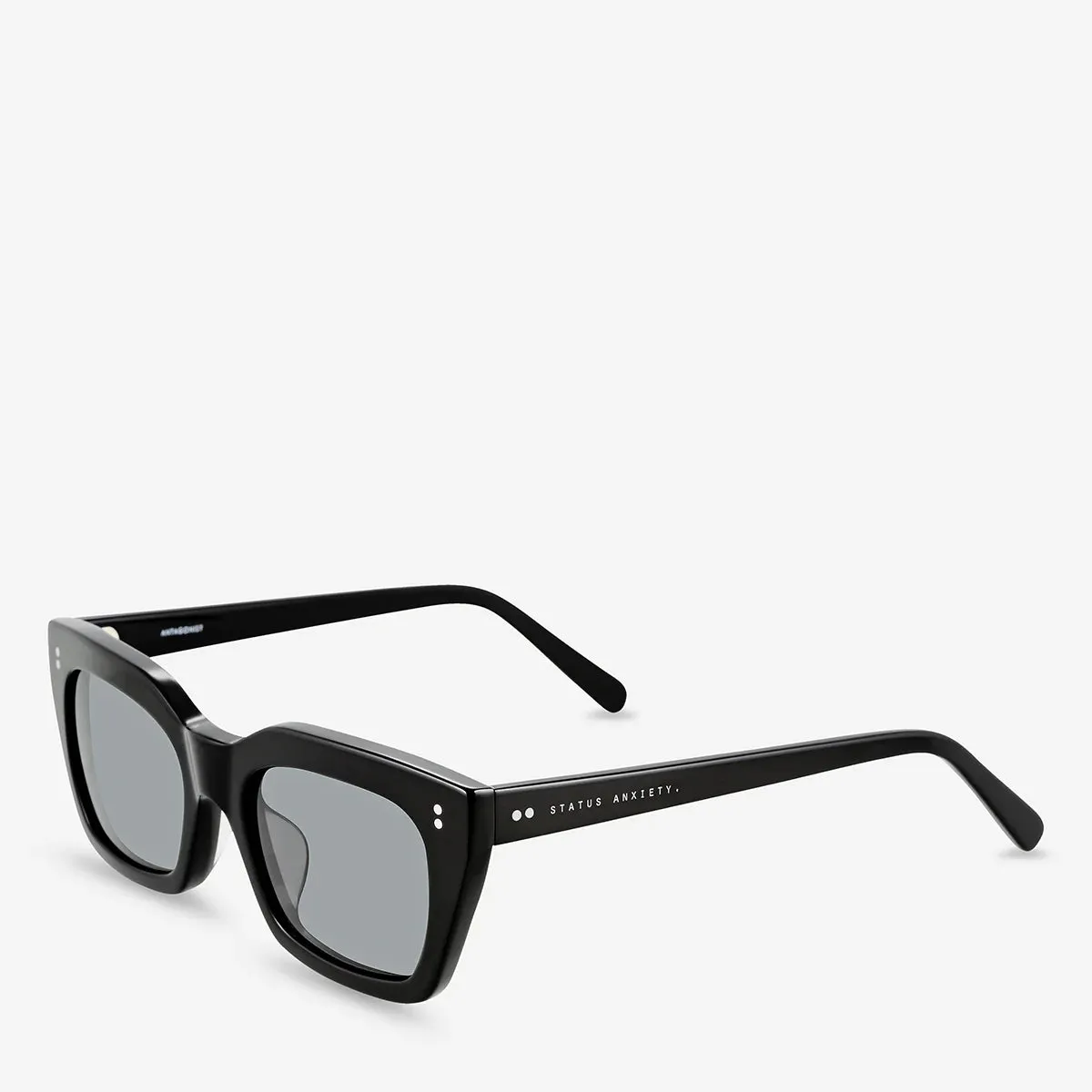 Status-Angst-Antagonist Schwarze Schuhe_Status-Anxiety