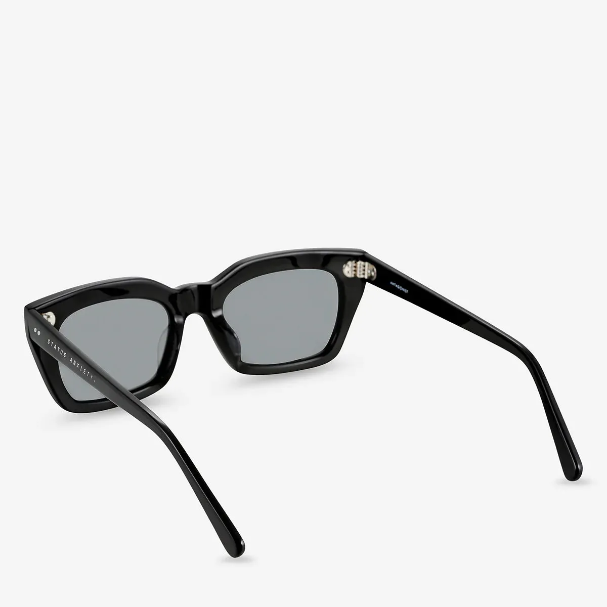 Status-Angst-Antagonist Schwarze Schuhe_Status-Anxiety